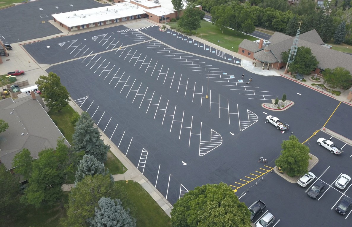 Professional parking lot with fresh striping creating excellent first impression